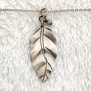 Handmade Silver Tone Leaf Pendant with Green Bead Accent Artisan Nature Jewelry